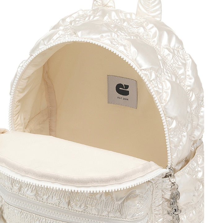 Carlyn Mellow in Pearl White