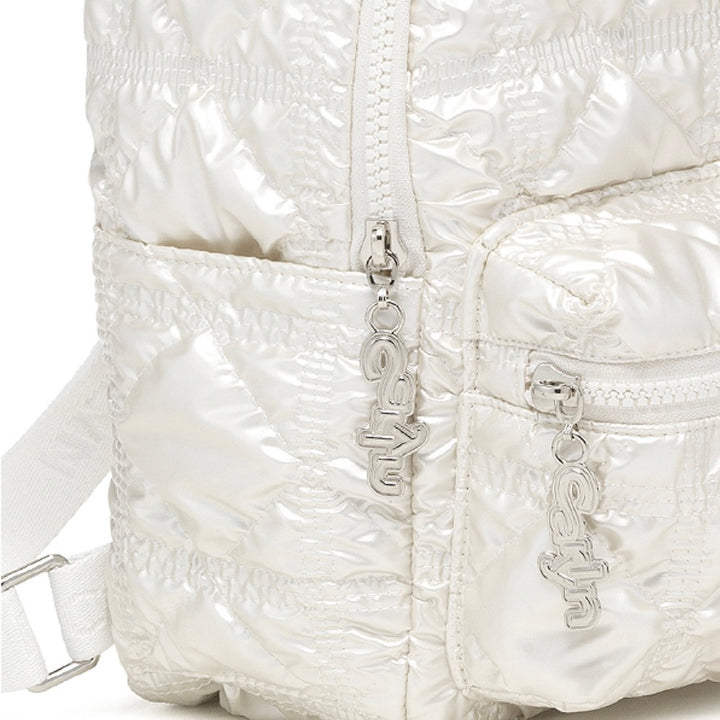 Carlyn Mellow in Pearl White
