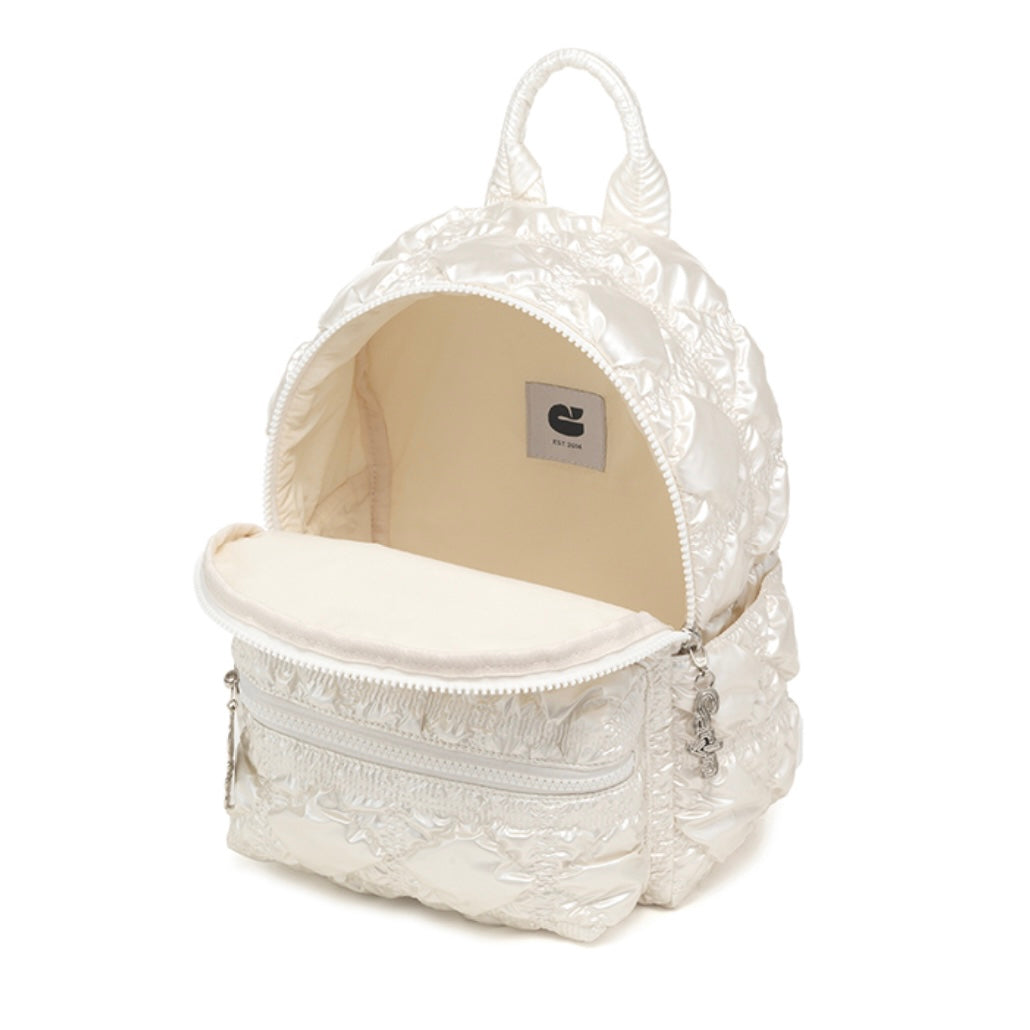 Carlyn Mellow in Pearl White