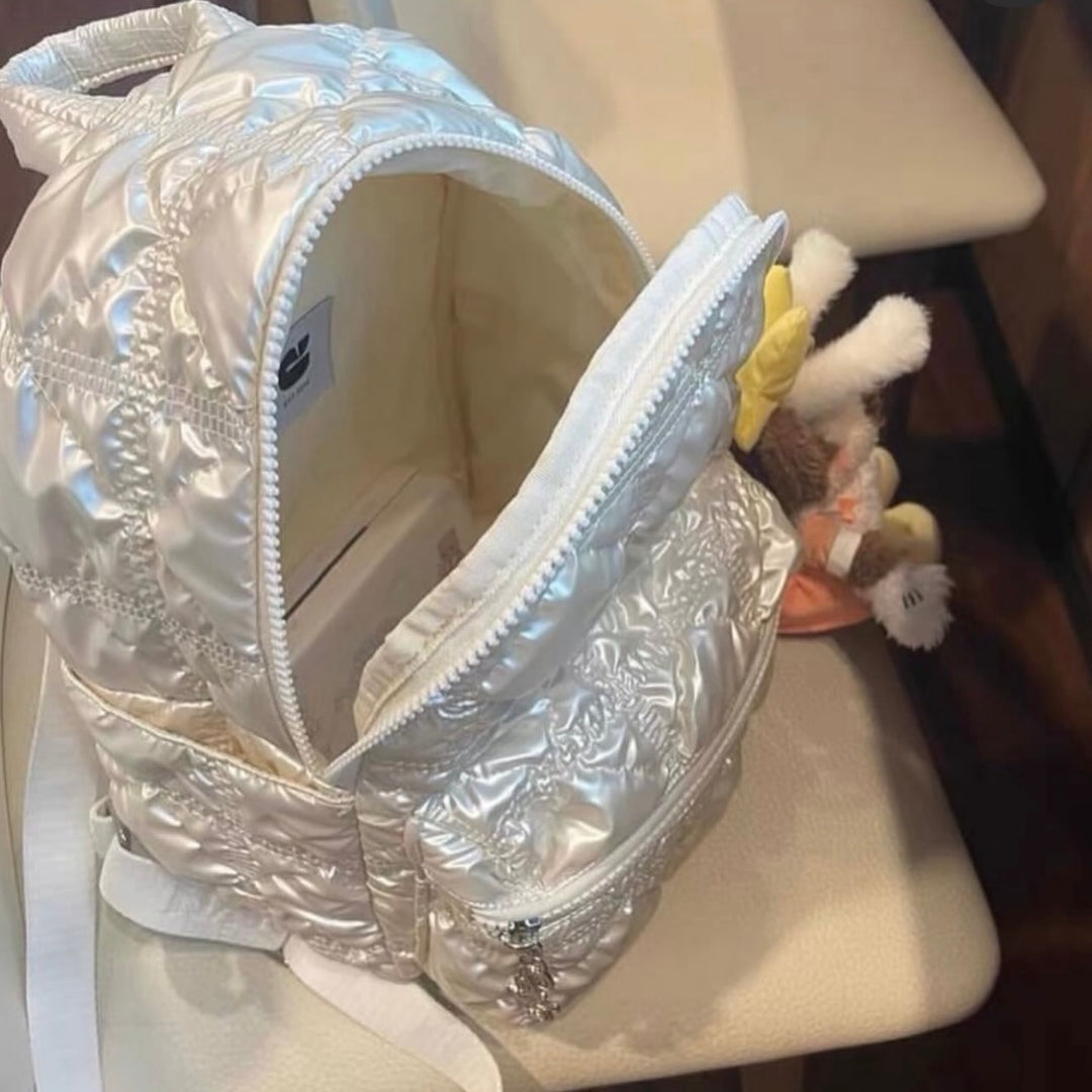 Carlyn Mellow in Pearl White