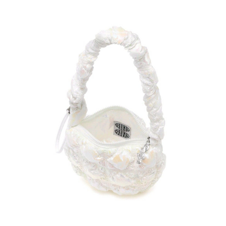 Carlyn Poing In Pearl White